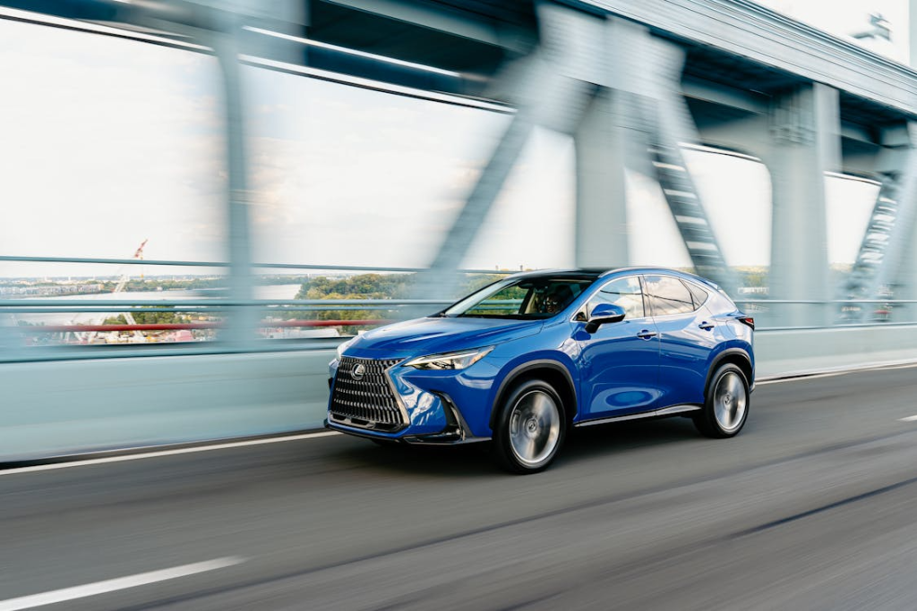 A speeding blue car