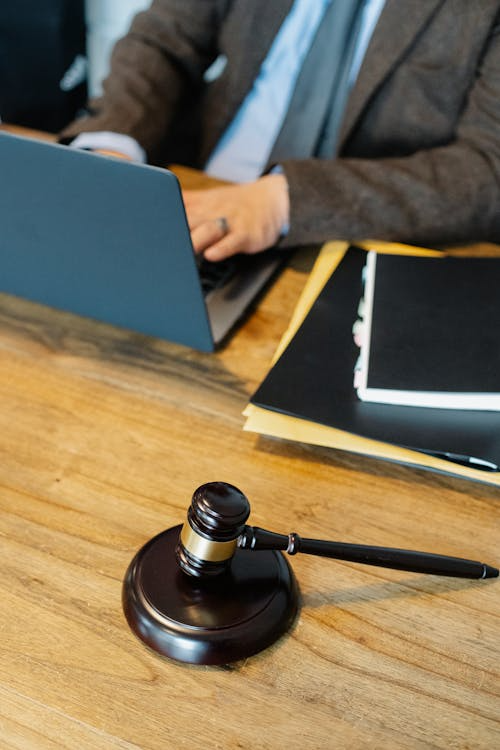 Wooden gavel resting on a polished wooden table, symbolizing DUI court proceedings in Ontario