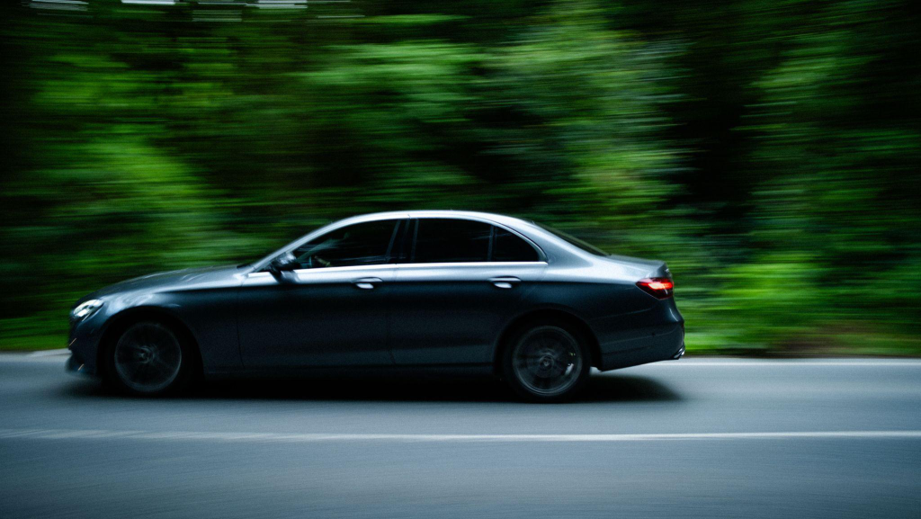 a driver speeding on a road