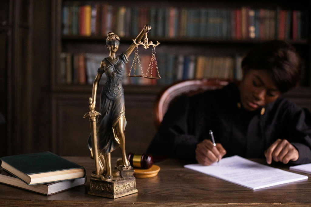 a judge writing on a document