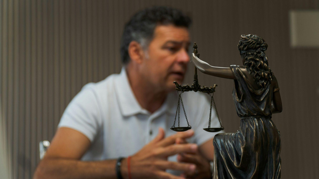 a lawyer conversing with a client