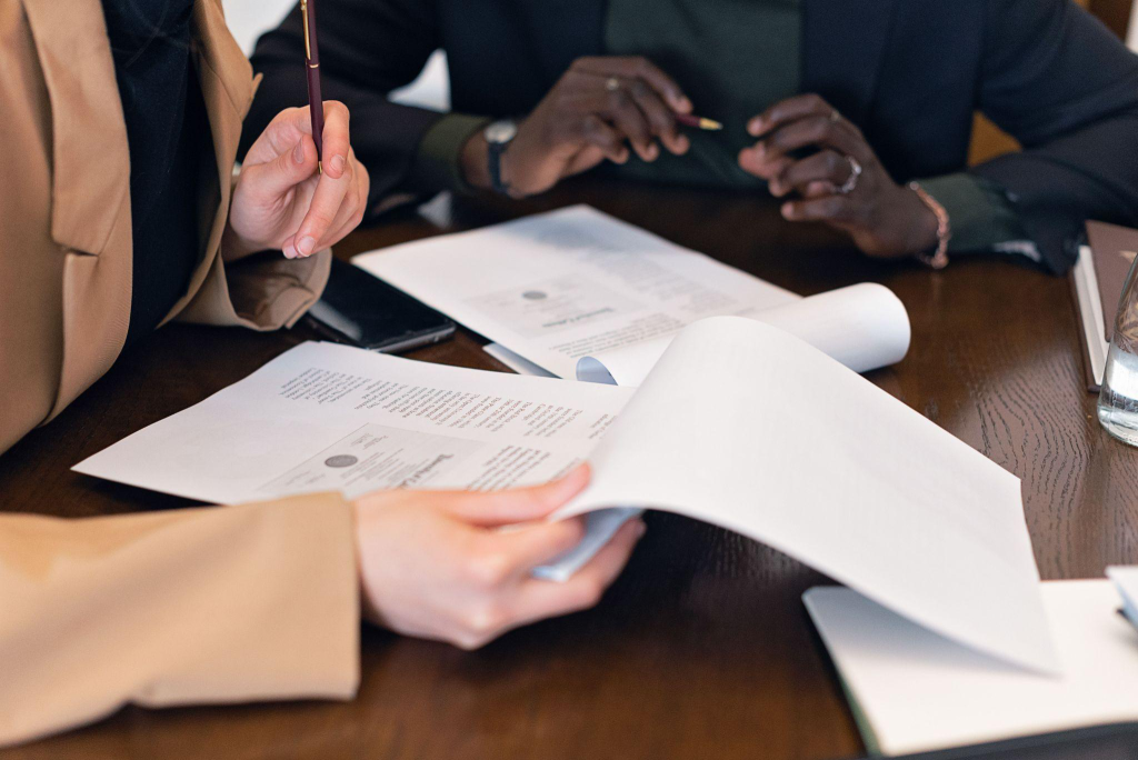 two people reviewing documents